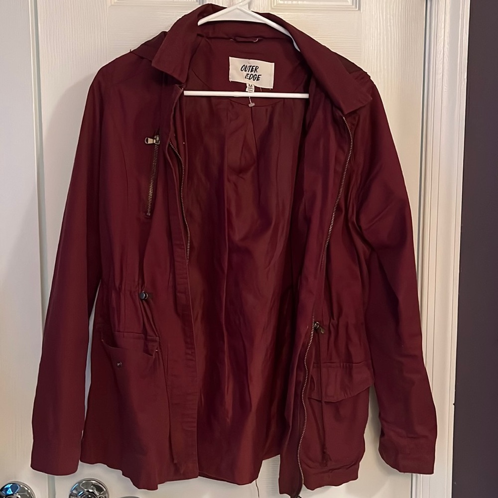 Women’s burgundy utility jacket.